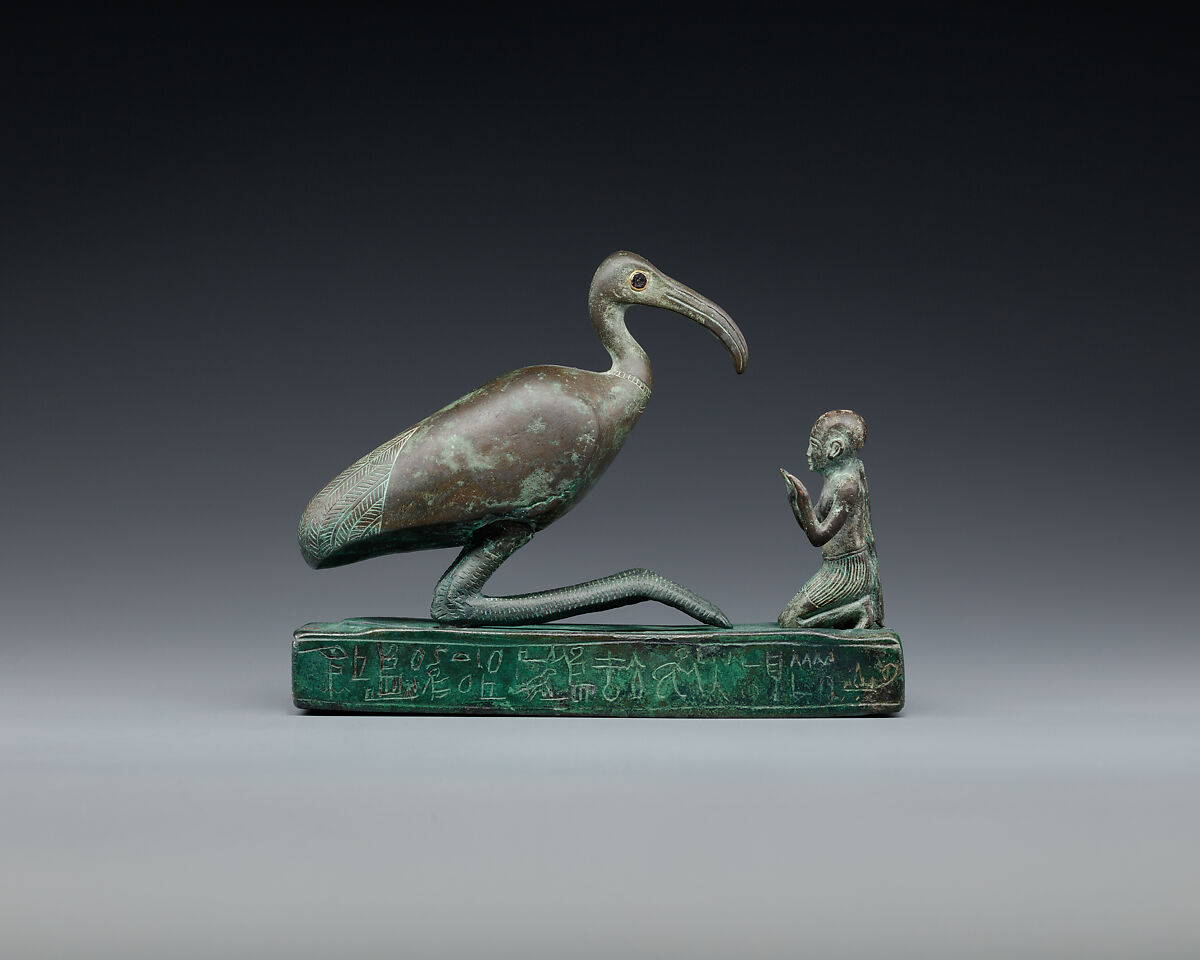 Group statue of Thoth-ibis and devotee on a base inscribed for Padihorsiese, copper alloy 