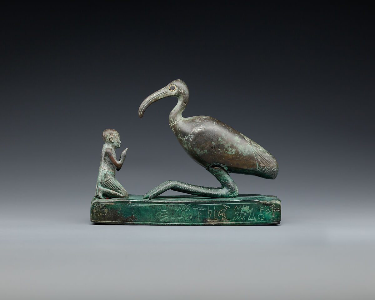 Group statue of Thoth-ibis and devotee on a base inscribed for Padihorsiese, Cupreous metal