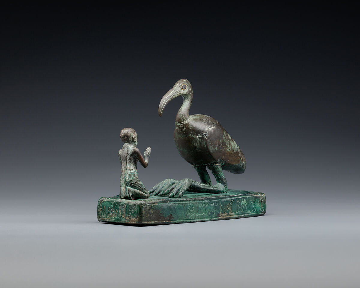 Group statue of Thoth-ibis and devotee on a base inscribed for Padihorsiese, Cupreous metal