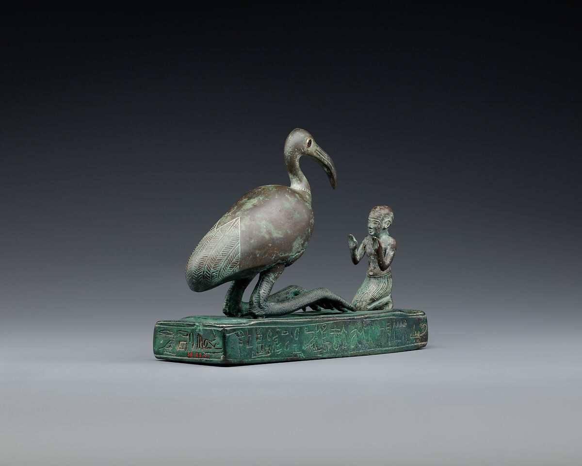 Group statue of Thoth-ibis and devotee on a base inscribed for Padihorsiese, Cupreous metal