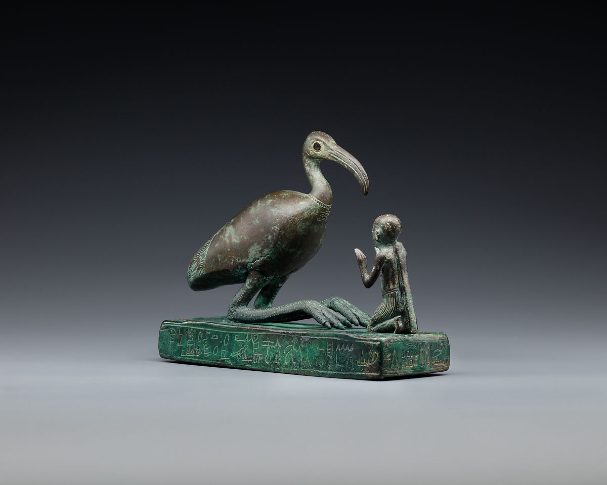 Group statue of Thoth-ibis and devotee on a base inscribed for Padihorsiese, Cupreous metal