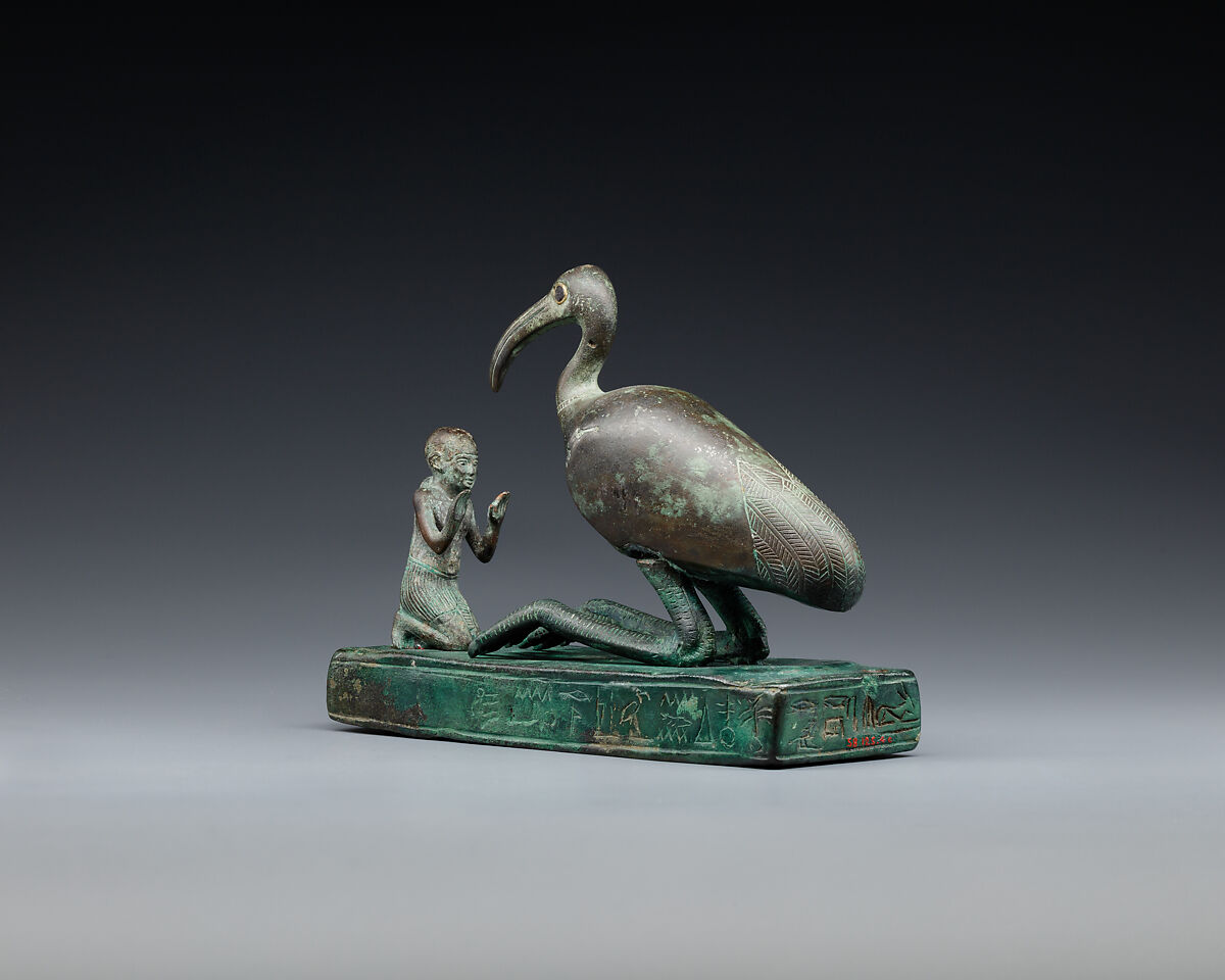 Group statue of Thoth-ibis and devotee on a base inscribed for Padihorsiese, Cupreous metal