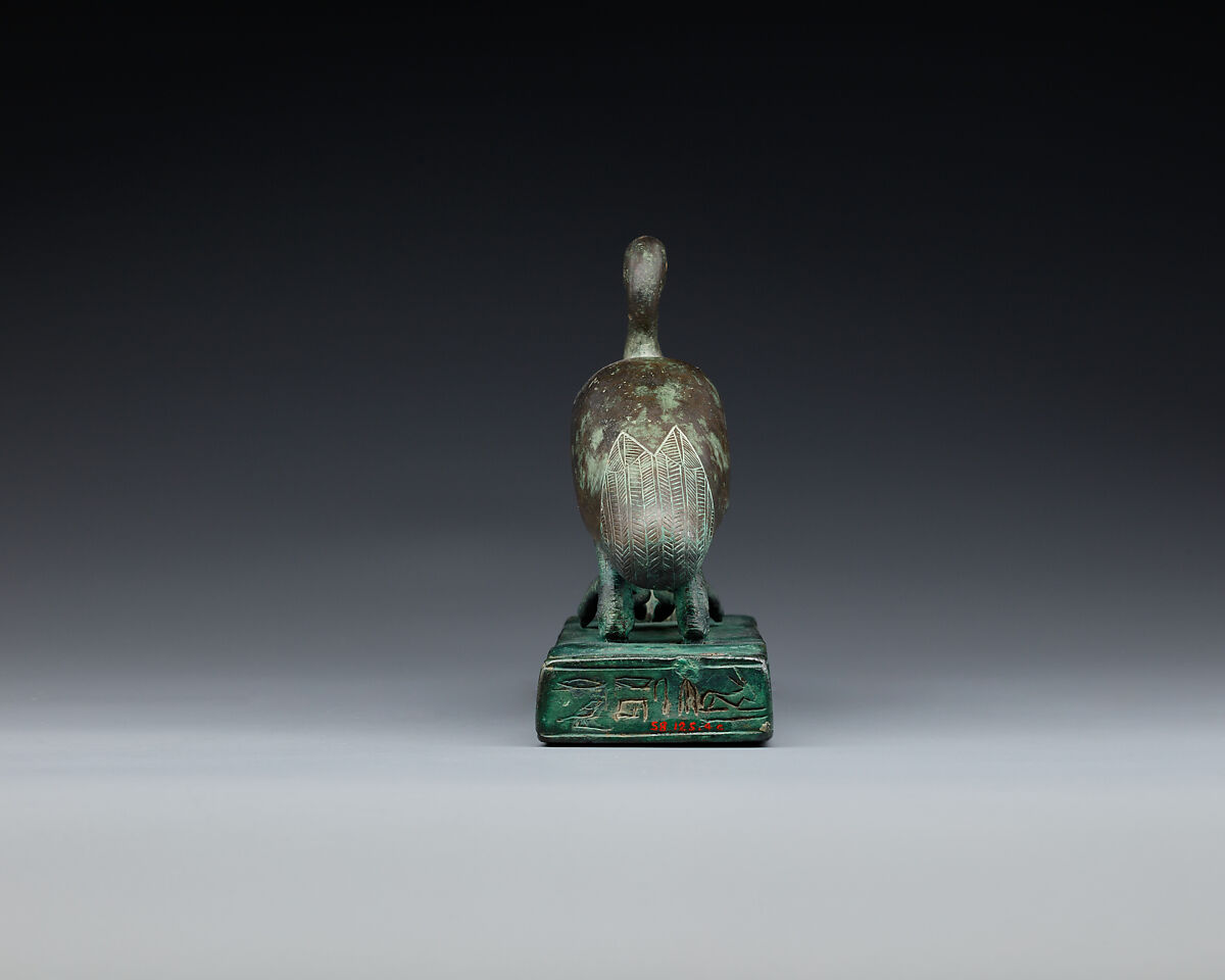 Group statue of Thoth-ibis and devotee on a base inscribed for Padihorsiese, Cupreous metal
