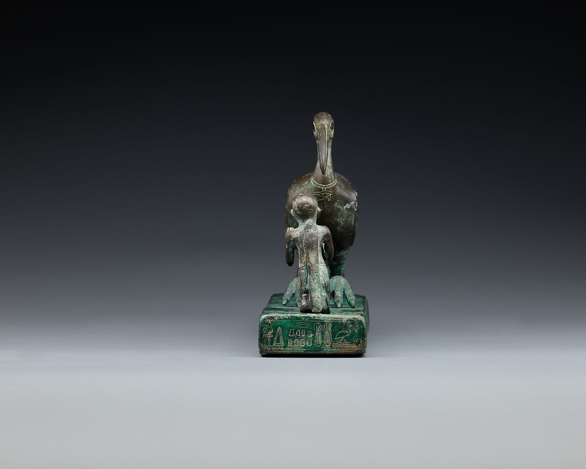 Group statue of Thoth-ibis and devotee on a base inscribed for Padihorsiese, Cupreous metal