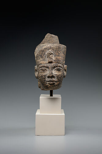 Head of a king in the red crown