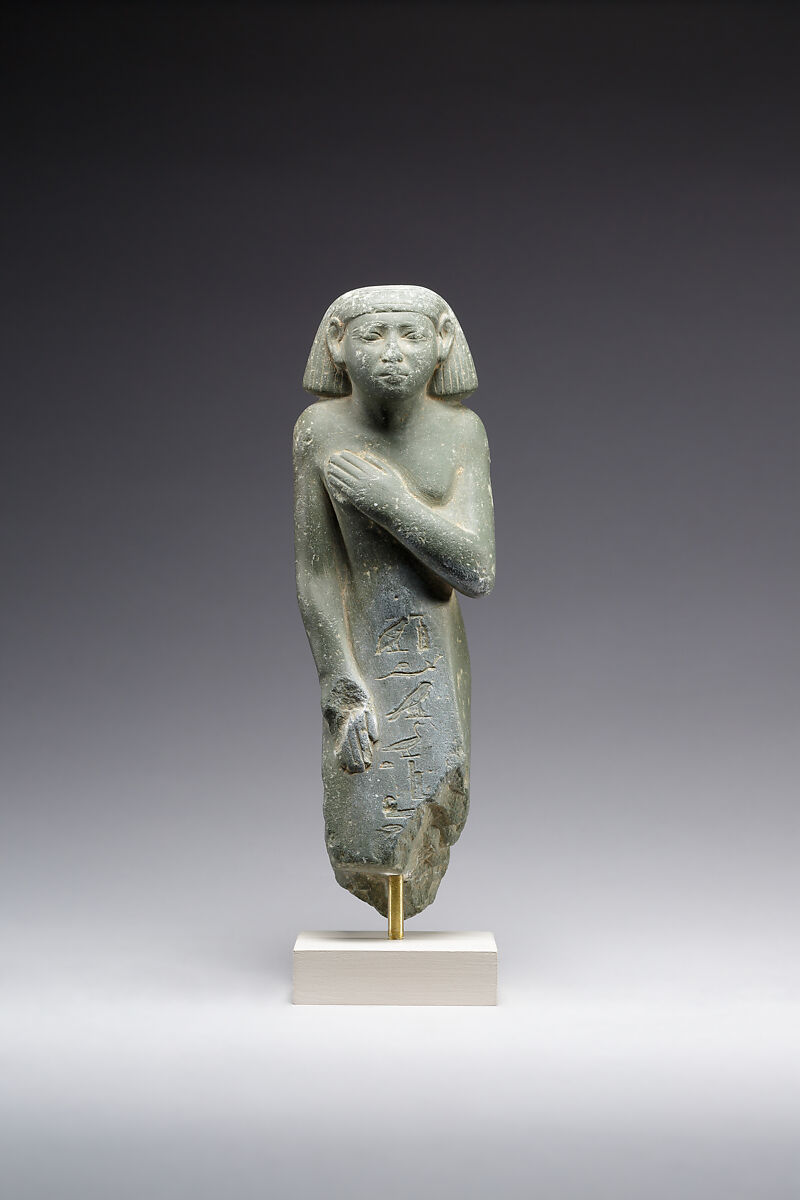 Middle Kingdom statuette, reinscribed for Harsiese High Priest of Memphis in the Third Intermediate Period, Greywacke
