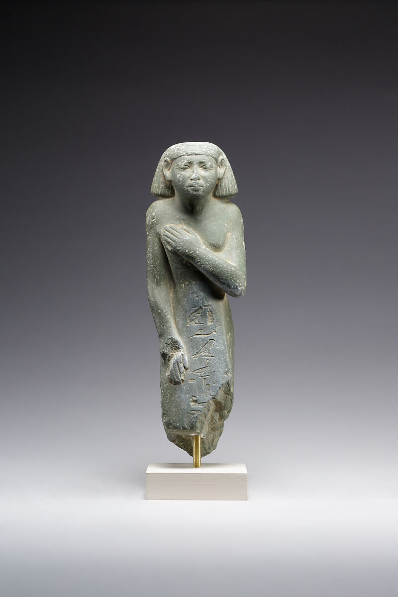 Middle Kingdom statuette, reinscribed for Harsiese High Priest of Memphis in the Third Intermediate Period, Greywacke 