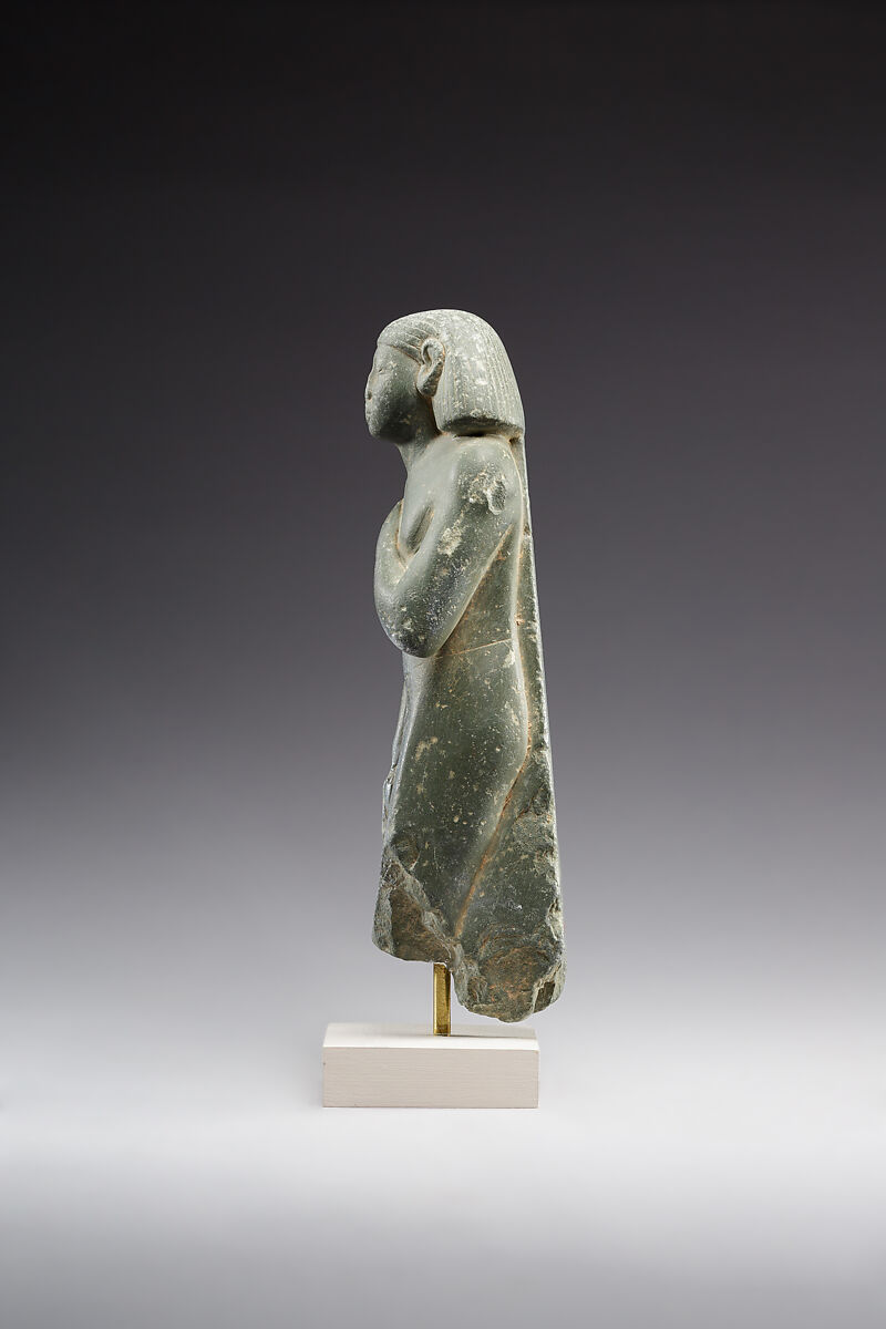 Middle Kingdom statuette, reinscribed for Harsiese High Priest of Memphis in the Third Intermediate Period, Greywacke