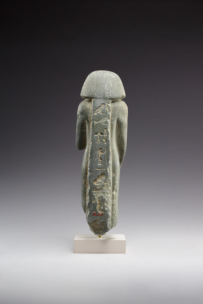 Middle Kingdom statuette, reinscribed for Harsiese High Priest of Memphis in the Third Intermediate Period, Greywacke