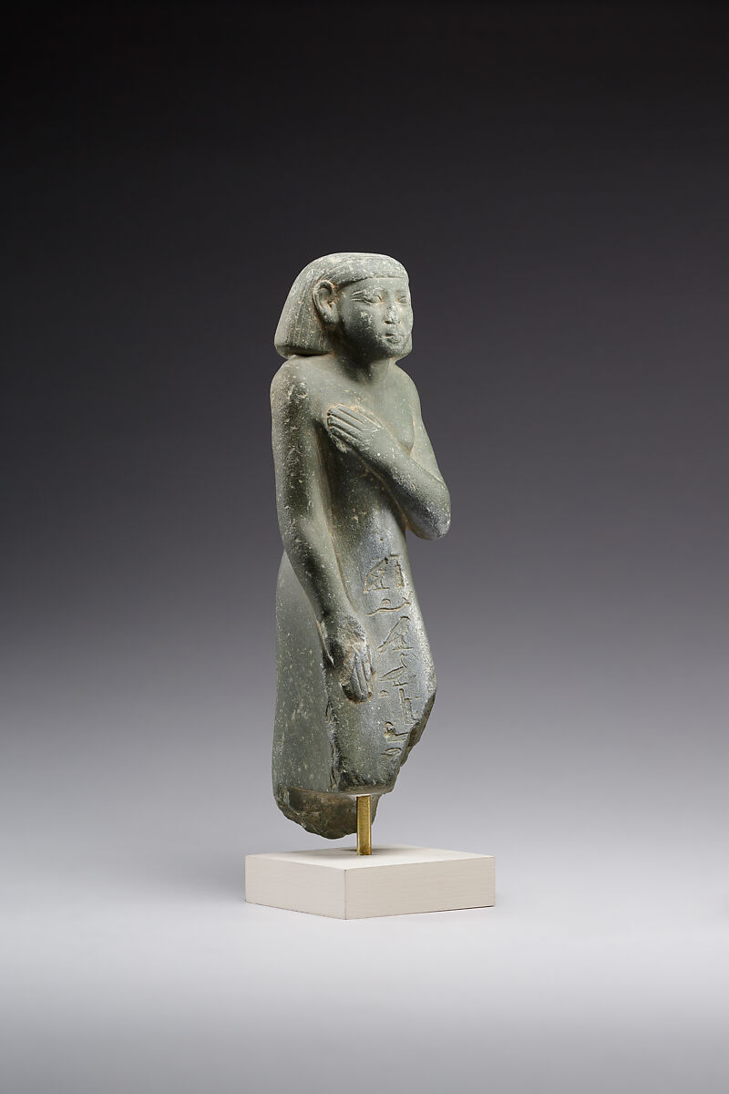 Middle Kingdom statuette, reinscribed for Harsiese High Priest of Memphis in the Third Intermediate Period, Greywacke