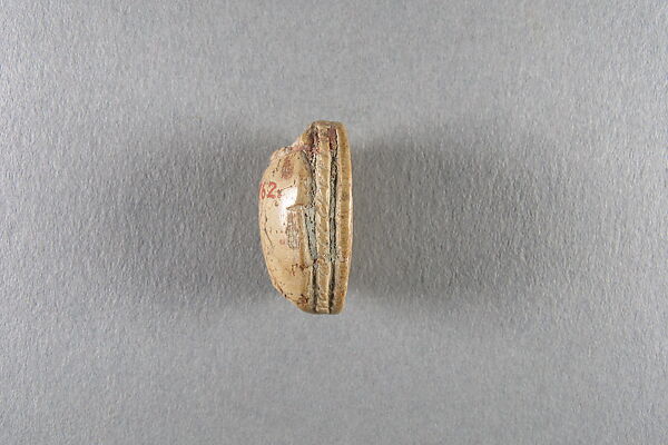 Scarab, Faience, traces of green glaze