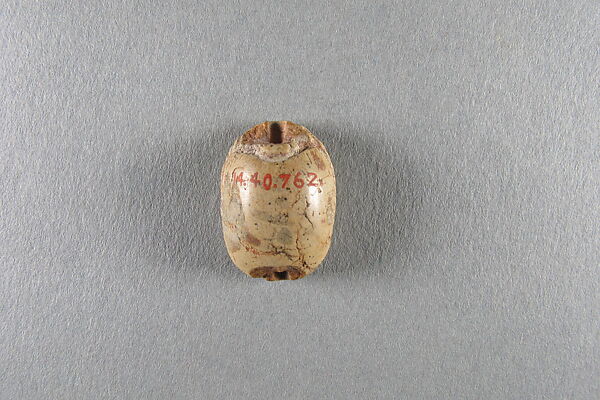 Scarab, Faience, traces of green glaze