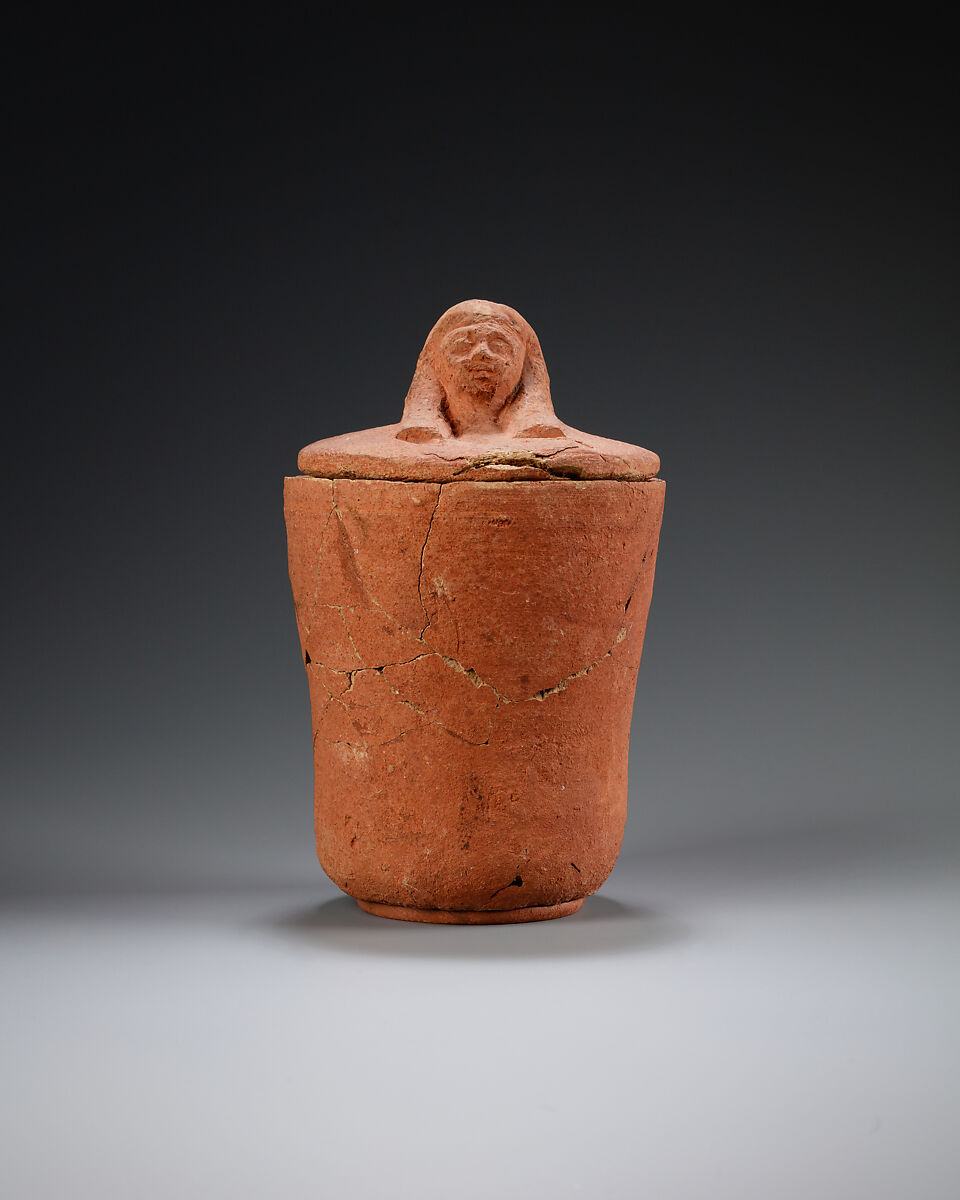 Canopic jar with human head, Pottery, paint 