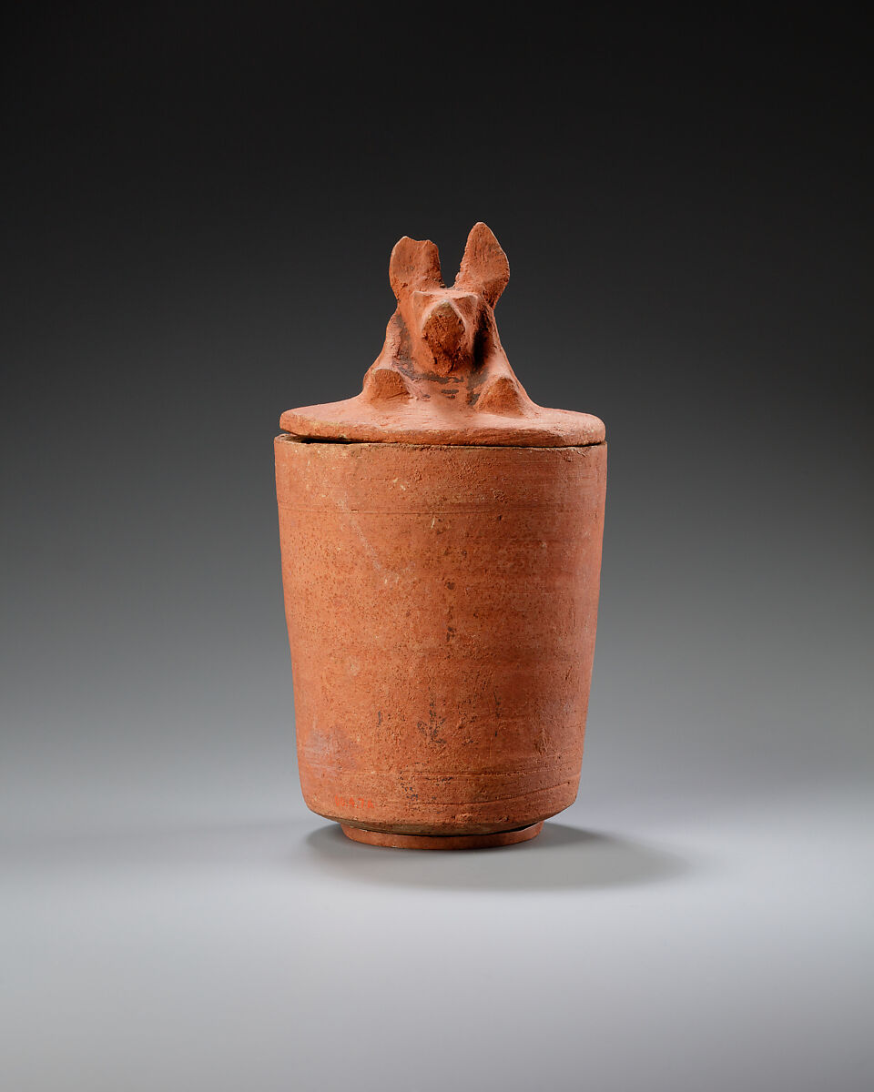 Canopic jar with jackal head, Pottery, paint 