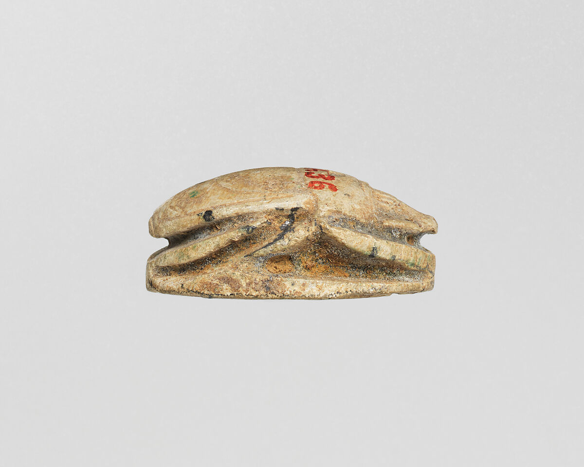 Scarab, Faience, traces of green glaze
