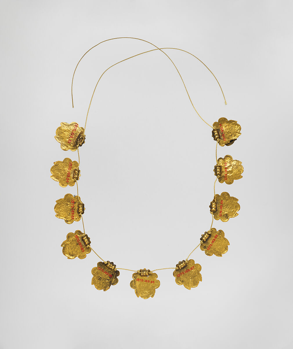 Group of 11 Pendant Heads, Gold