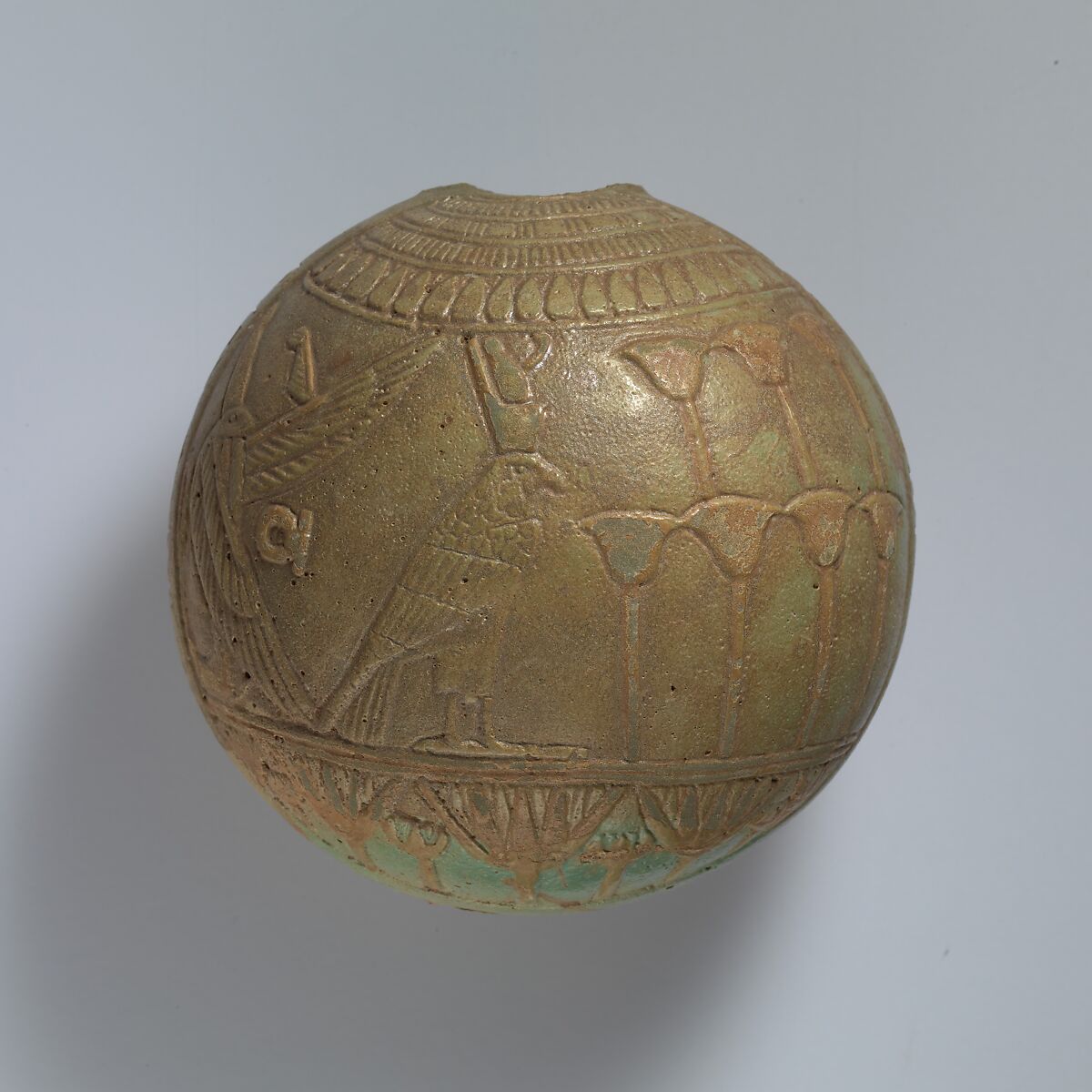 Relief-decorated Lentoid Bottle ("New Year's Bottle"); Horus falcon in marshes on one side; cow goddess in marshes on the other, Faience