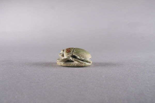 Scarab with Winged Uraeus (Wadjet) on Gold Hieroglyph, Faience