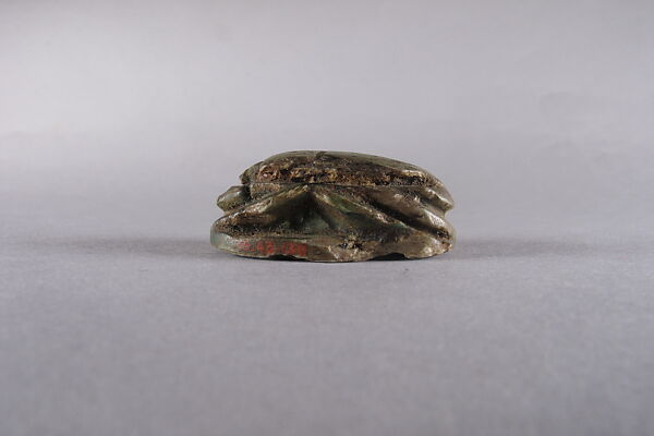 Scarab with Bes and prisoners, Glazed steatite