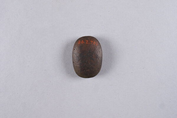 Oval plaque with hieroglyphs, Dark brown steatite