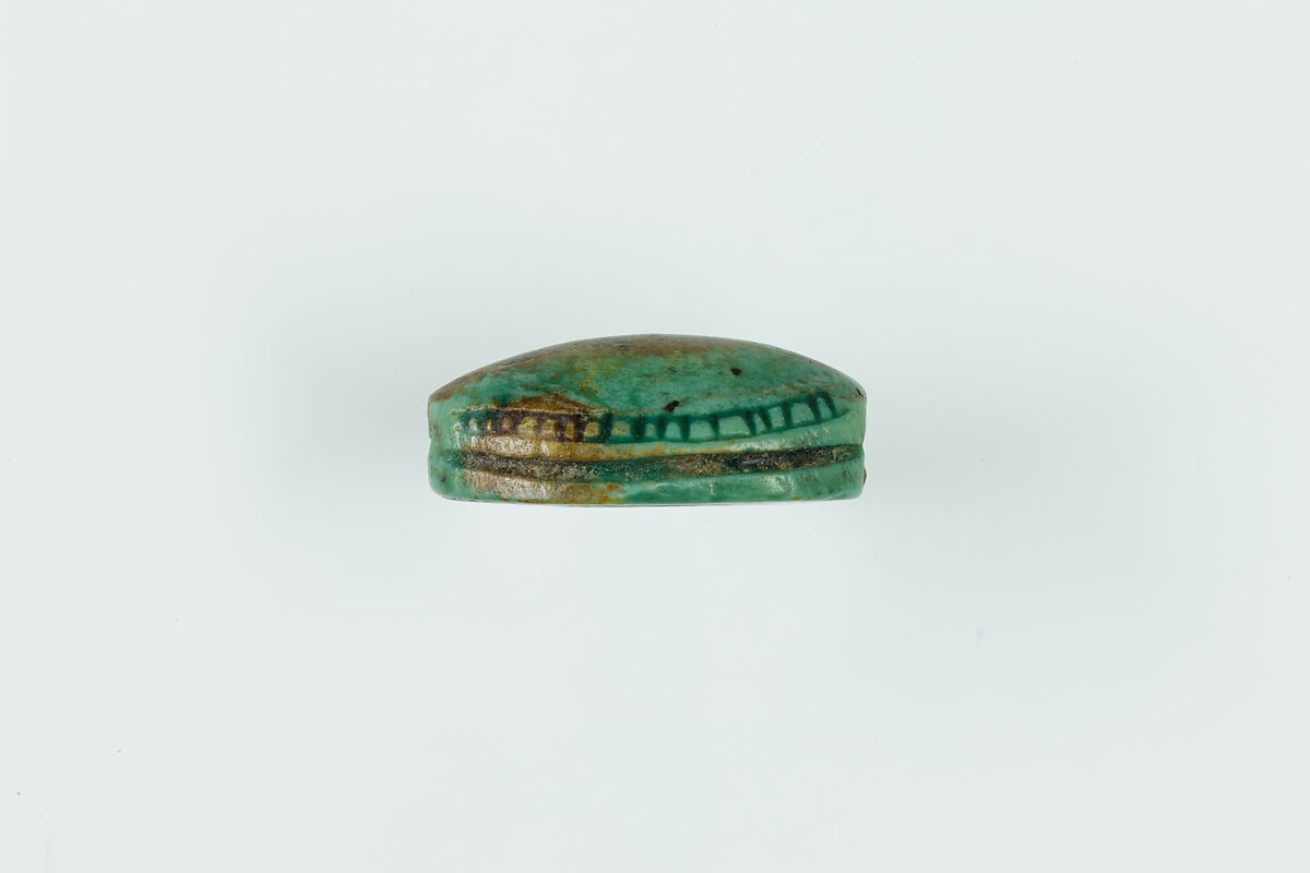 Cowroid with Outward-facing Merged Lions and Sun Disk, Glazed steatite