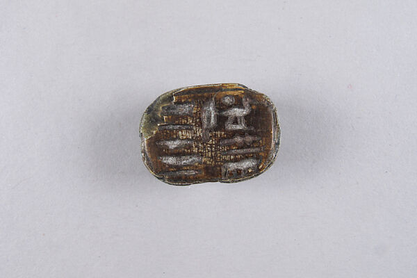 Scarab of Kushite Ruler Senkamanisken, Steatite, traces of glaze 