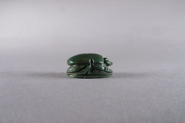 Scarab with the name and title of a priest of Amun, Green jasper
