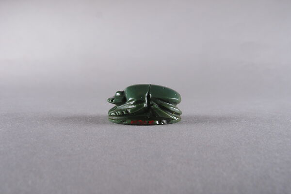 Scarab with the name and title of a priest of Amun, Green jasper