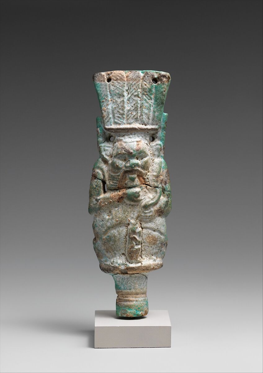 Bes with child on finial, Faience 