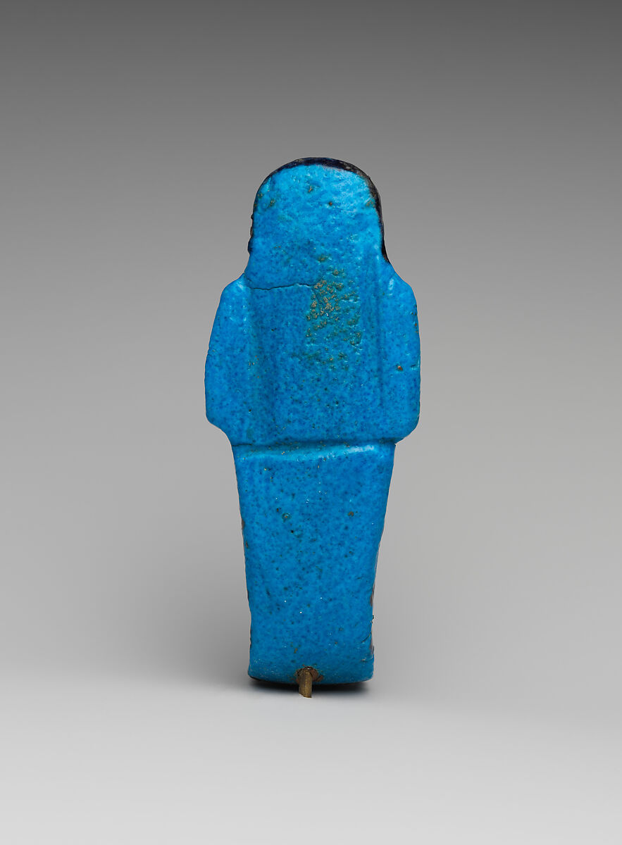 Shabti of the Adoratrice of Hathor Henettawy, wife of Painedjem I, Faience