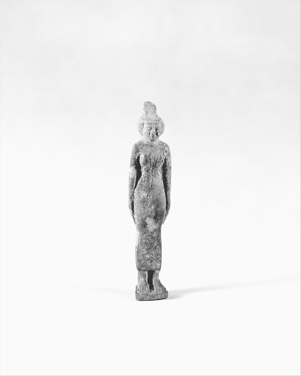 Statuette of Neith with the name of Shabaqo, pale green stone: hedenbergite quartz 