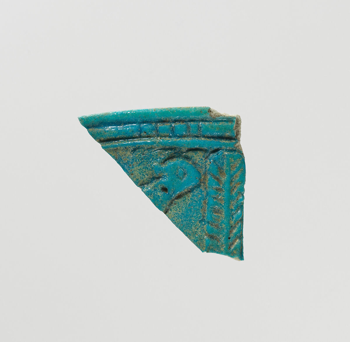 Rim fragment with head of calf and "stylized trees", Faience 