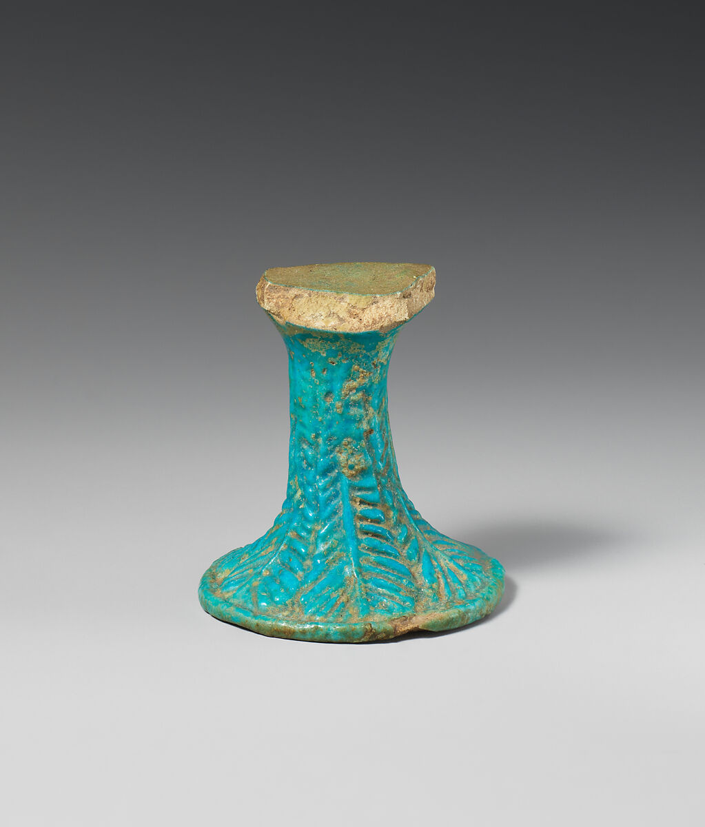 Stem of lotiform goblet with palm fronds in relief, Faience