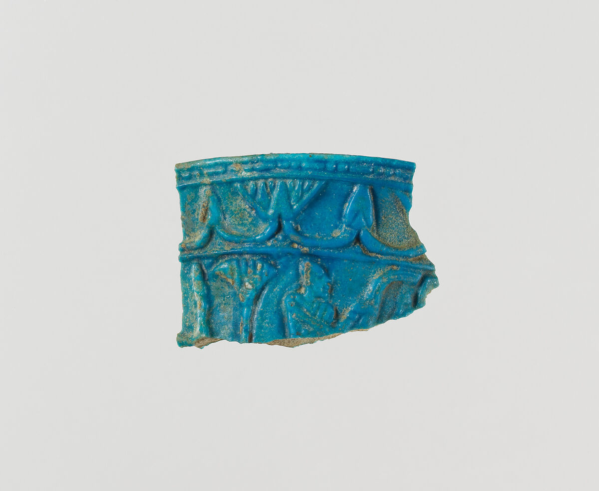 Chalice rim fragment with floral chain and scene of man in papyrus, Faience 