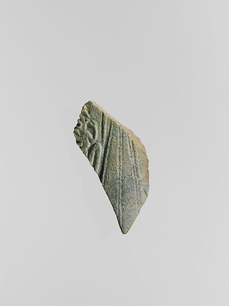 Vessel fragment with child in marshes, Faience