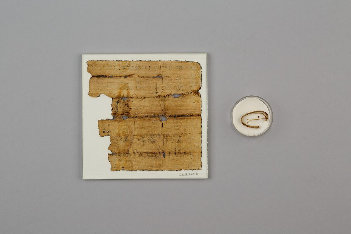 Papyrus charm, Papyrus, ink