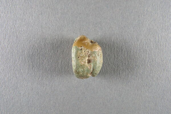 Scarab of Usermaatre, White faience, traces of green glaze