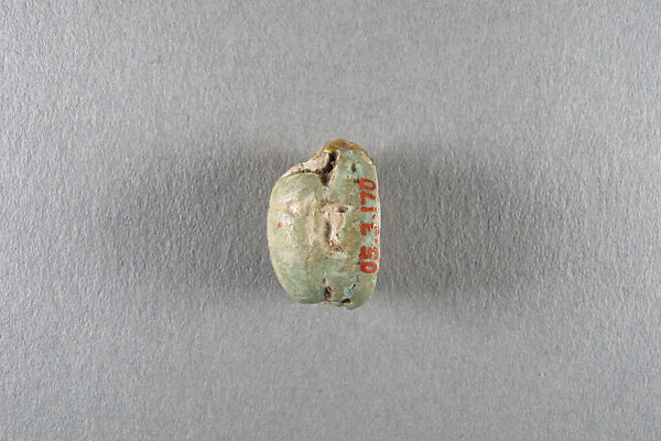 Scarab of Usermaatre, White faience, traces of green glaze