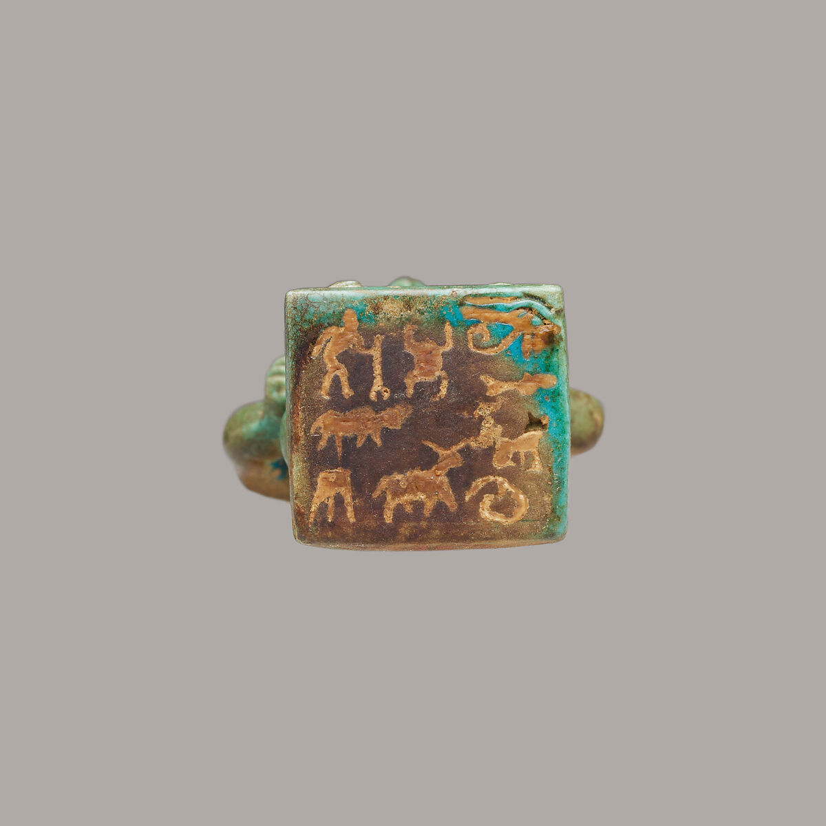 Pataikos Amulet with seal on base, Faience