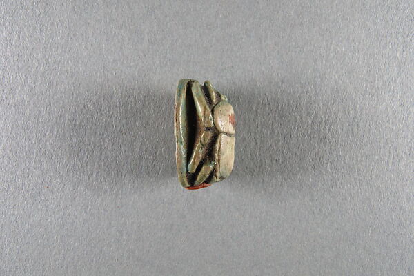 Scarab inscribed with the name Shepenwepet, Steatite, traces of green glaze