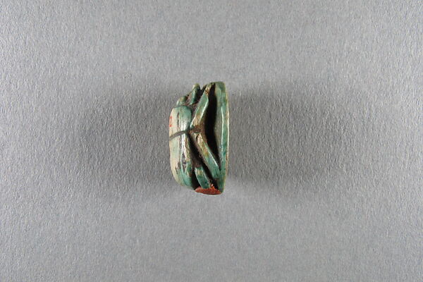 Scarab inscribed with the name Shepenwepet, Steatite, traces of green glaze