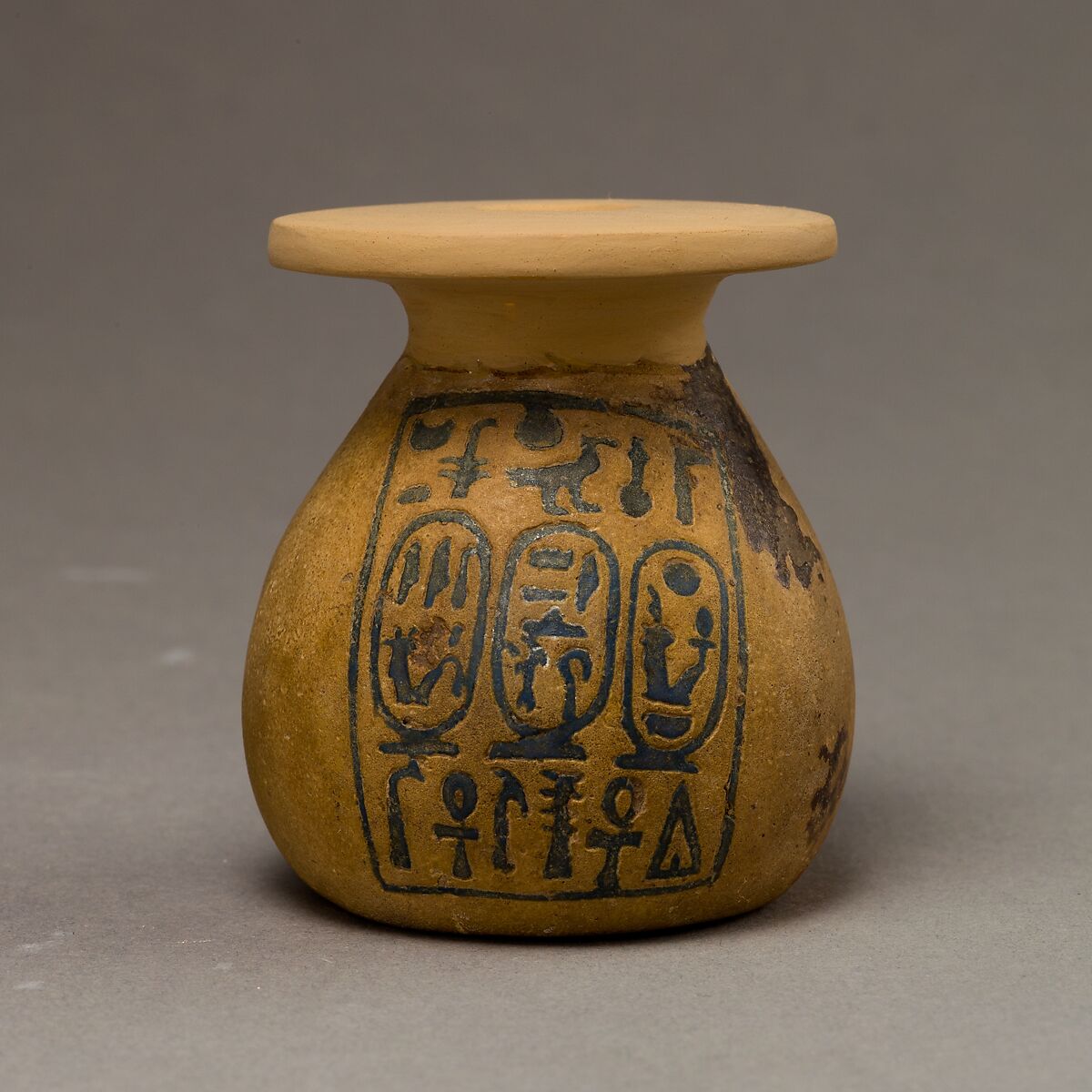Kohl Jar Inscribed with the Names of Amenhotep III and Queen Tiye, Faience