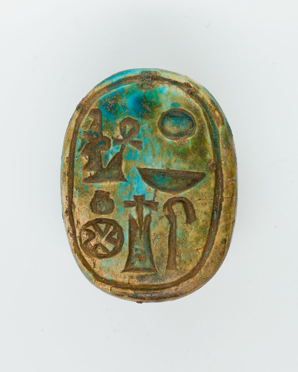 Scarab of Amenhotep III, ruler of Heliopolis, Green glazed steatite 