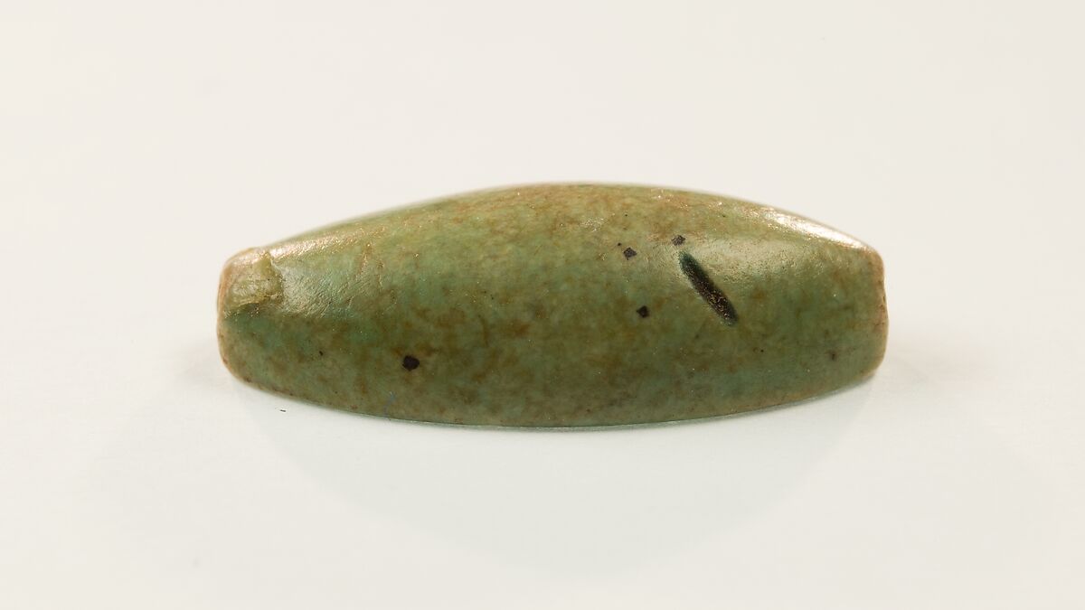 Cowroid with a Hathor emblem, Faience