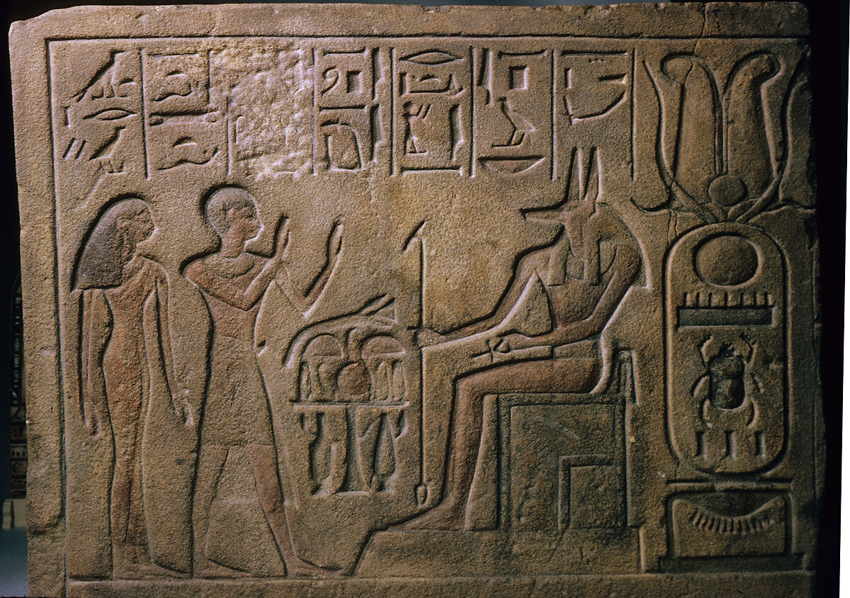 Relief showing a priest and a woman worshipping Anubis, Sandstone, paint