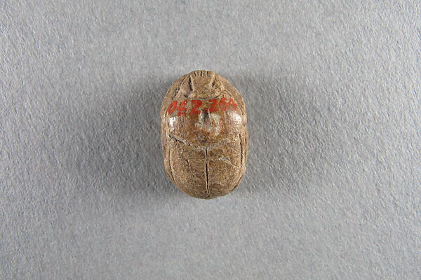 Scarab inscribed with the name of Unis, Steatite, traces of glaze