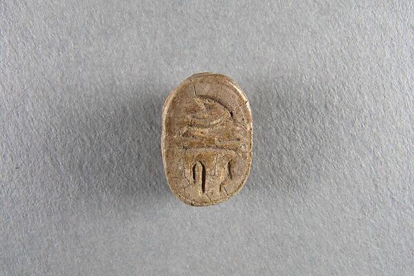 Scarab inscribed with the name of Unis, Steatite, traces of glaze 