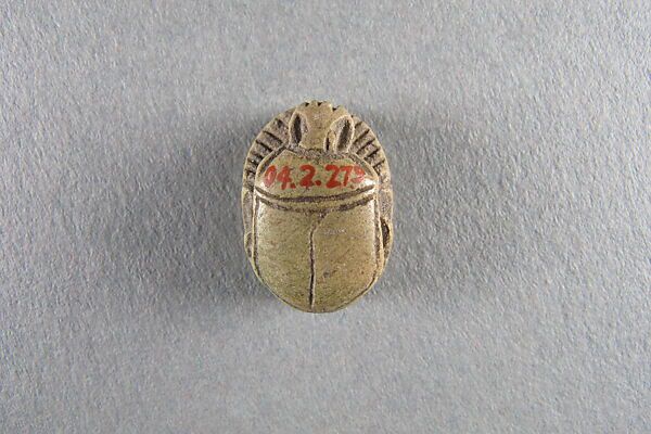 Scarab Inscribed for Thutmose III, Faience, light green glaze