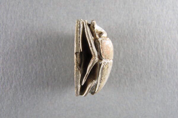 Scarab Decorated with Falcon Flying over Beetle, Steatite, traces of white glaze