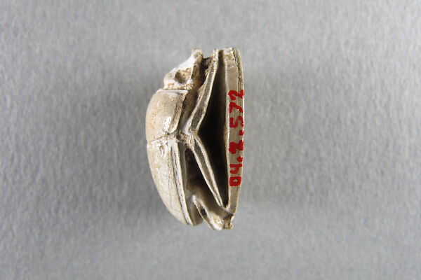 Scarab Decorated with Falcon Flying over Beetle, Steatite, traces of white glaze